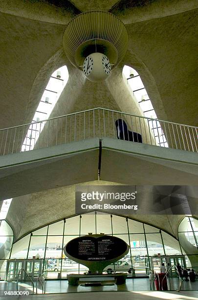 Clock hangs in the middle of the ceiling of John F. Kennedy International Airport's famed Terminal 5, designed by Eero Saarinen, on October 1, 2004....