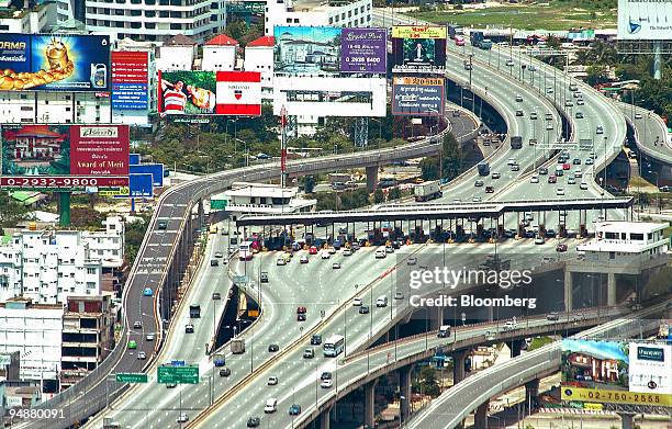 View of part of the Bangkok toll motorway with toll booth, center, taken from Thailand's highest building, the Boyoke 2 tower, in downtown Bangkok...