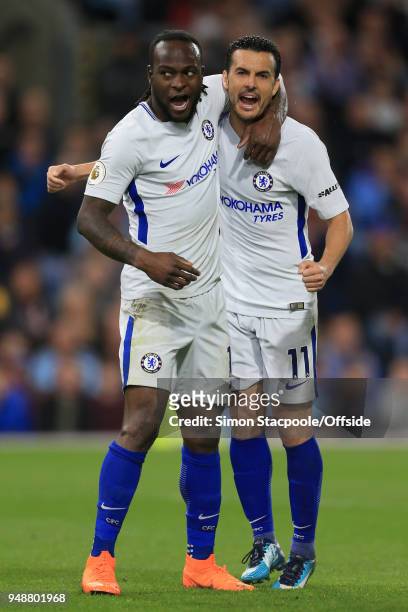 Victor Moses of Chelsea celebrates with teammate Pedro of Chelsea after scoring their 2nd goal during the Premier League match between Burnley and...