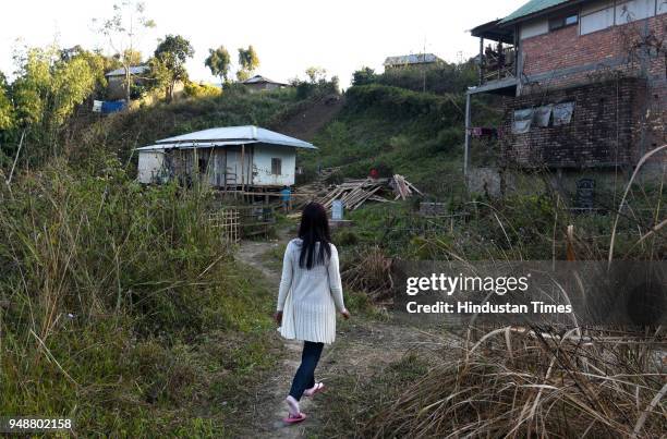 Girl who was a victim of trafficking and identity theft outside her home at Churachandpur on January 22, 2018 some 200 Km from Imphal, India....