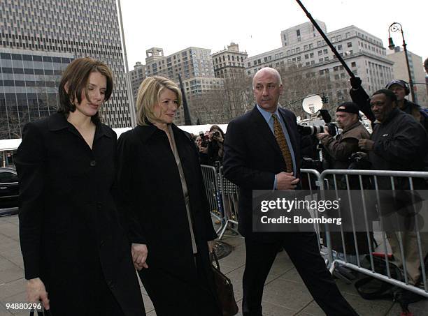 Martha Stewart, arrives with her bodyguard Frank Senerchia, right, and daughter Alexis, left, at Manhattan Federal Court in New York on March 2, 2004.