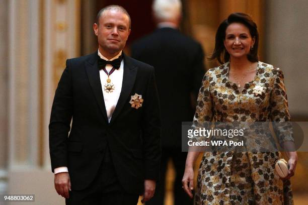 Malta's Prime Minister Joseph Muscat and his wife Michelle arrive to attend The Queen's Dinner during The Commonwealth Heads of Government Meeting at...
