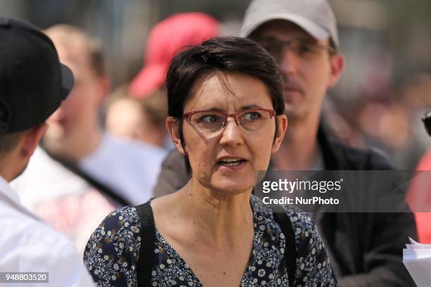 French former far-left Lutte Ouvriere party presidential candidate Nathalie Arthaud takes part in a demonstration on April 19, 2018 in Paris, as part...