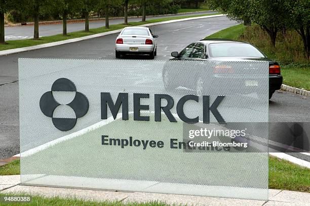 Cars enter the Merck employee entrance off route 22 in Readington Township, New Jersey, Thursday, September 30, 2004. Merck & Co. Withdrew Vioxx, the...