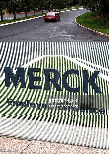 Cars enter the Merck employee entrance off route 22 in Readington Township, New Jersey, Thursday, September 30, 2004. Merck & Co. Withdrew Vioxx, the...