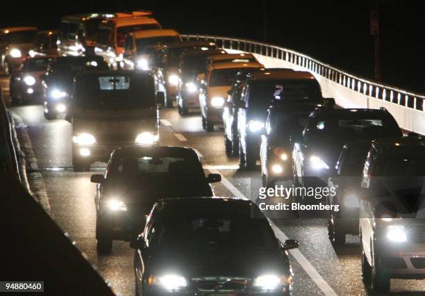 Traffic moves along a highway in Tokyo, Japan, on Wednesday, Feb. 27, 2008. Former U.K. Prime Minister Tony Blair urged the U.S., Japan and European...