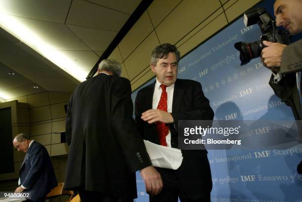 Gordon Brown, International Monetary and Financial Committee Chairman departs from the stage after a joint press conference with Rodrigo de Rato,...