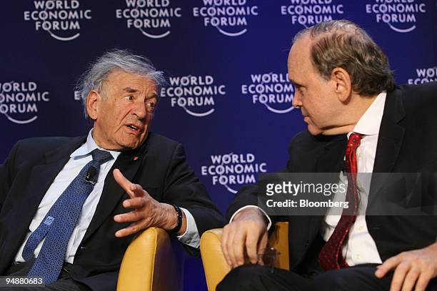 Elie Wiesel, nobel laureate and Boston University professor, left, talks with Daniel Yergin, chairman of Cambridge Energy Research, before the...