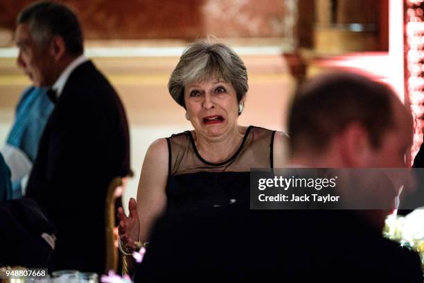 British Prime Minister Theresa May attends the Queen's Dinner at Buckingham Palace in the week of the 'Commonwealth Heads of Government Meeting' on...