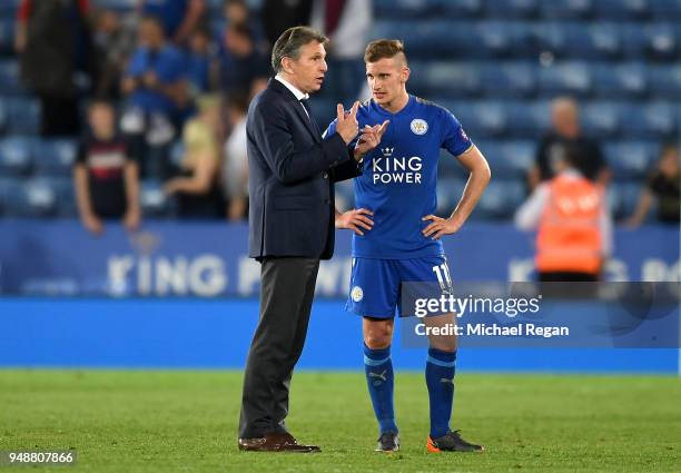 Claude Puel, Manager of Leicester City speaks to Marc Albrighton of Leicester City after the Premier League match between Leicester City and...