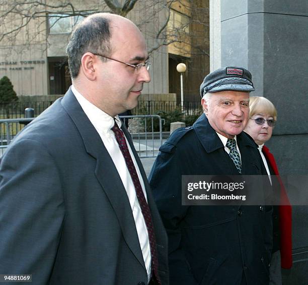 John Rigas, center, founder and former chairman, Adelphia Communications Corp. Arrives at Manhattan Federal Court in New York for opening statements...