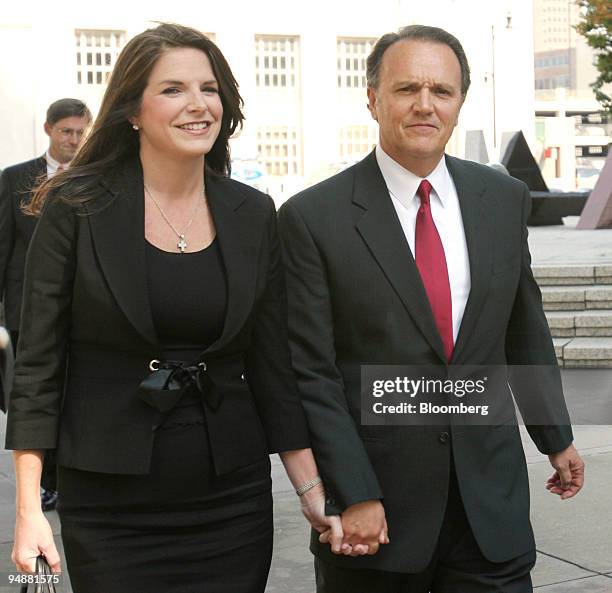 Richard Scrushy and his wife Leslie, leave federal court in Birmingham, Alabama, Wednesday September 29, 2004. HealthSouth Corp. Founder Richard...