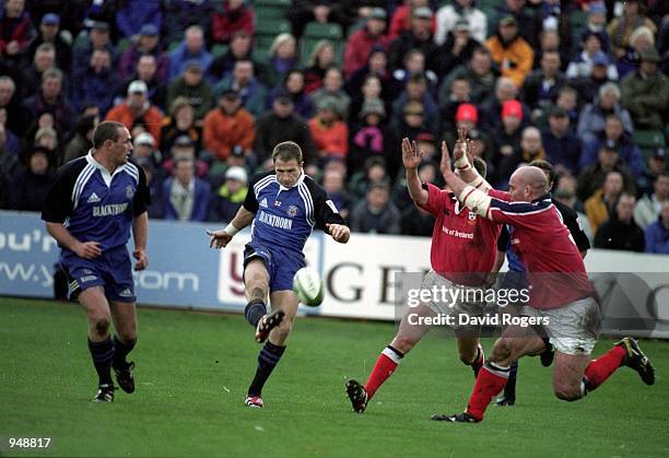 Mike Catt of Bath takes on John Hayes and Ronan O''Gara of Munster during the Heineken Cup Pool 4 match played at the Recreation Ground, in Bath,...