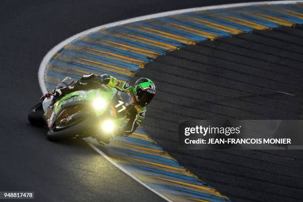 French rider Randy de Puniet on his Kawasaki Formula EWV N°11 competes during a night practice session, on April 19 in Le Mans, northwestern France,...