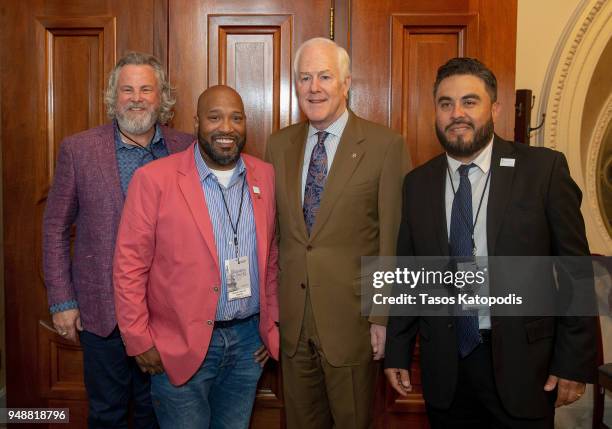 Senator John Cornyn takes a photo with members at the Recording Academy's annual GRAMMYs on the Hill Advocacy Day on Capital Hill on April 19, 2018...