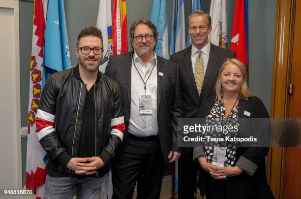 Senator John Thune takes a photos with members at the Recording Academy's annual GRAMMYs on the Hill Advocacy Day on Capital Hill on April 19, 2018...