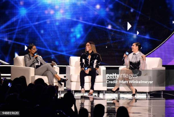 Lilly Singh, Winnie Harlow, and Sofia Carson onstage at WE Day California at The Forum on April 19, 2018 in Inglewood, California.