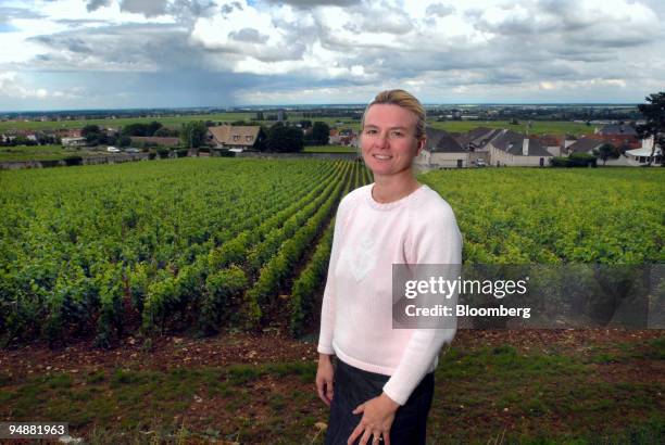 Christine Lestime, owner of the Clos Saint-Jean vineyard poses in front of her property in the Burgundy village Chassagne-Montrachet, France, on...