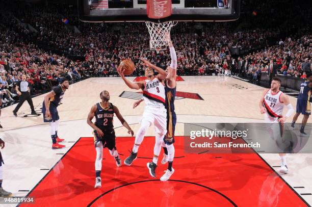 McCollum of the Portland Trail Blazers shoots a layup during the game against the New Orleans Pelicans in Game One of the Western Conference...