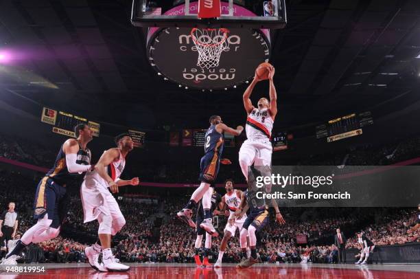 McCollum of the Portland Trail Blazers goes to the basket against the New Orleans Pelicans in Game One of the Western Conference Quarterfinals during...