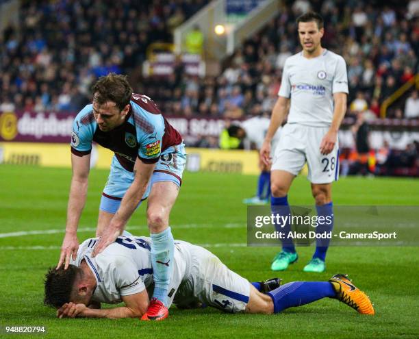 Burnley's Ashley Barnes checks on Chelsea's Gary Cahill after a collision in the first half during the Premier League match between Burnley and...