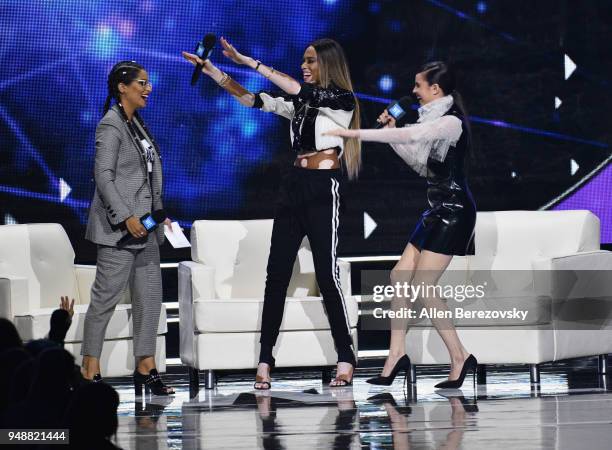 Lilly Singh, Winnie Harlow and Sofia Carson speak onstage at WE Day California at The Forum on April 19, 2018 in Inglewood, California.