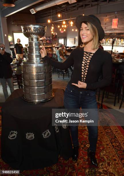 Singer Cassadee Pope is seen with the Stanley Cup Trophy at Vinyl Tap on April 19, 2018 in Nashville, Tennessee.