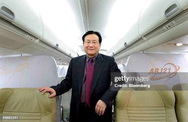 Tang Xiaoping, general manager for commercial aircraft at China Aviation Industry Corp. I, poses in a mockup of the company's ARJ21 regional...