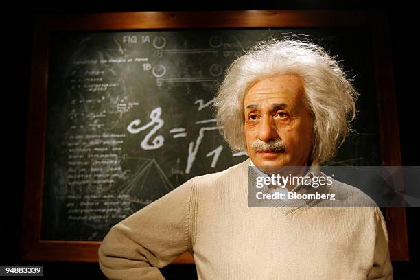 Wax figure of Albert Einstein, German-born physicist, stands on display at Madame Tussauds prior to the exhibition's public opening, in Berlin,...