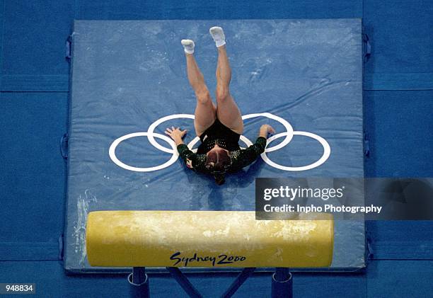Denisse Lopez of Mexico lands on her back during the Womens Gymnastics Vault Final at the Sydney SuperDome on Day 9 of the Sydney 2000 Olympic Games...