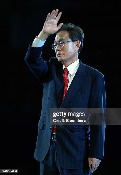 Park Hee Tae, newly elected representative of the Grand National Party, reacts to his supporters during the party's convention in Seoul, South Korea,...