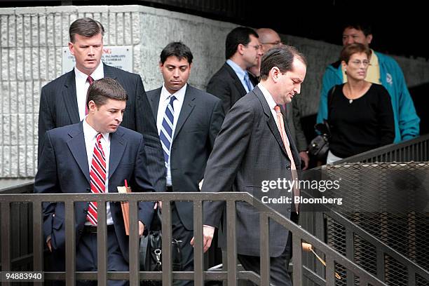 Alexander Acosta, U.S. Attorney for the Southern District of Florida, foreground right, exits the U.S. Federal Courthouse with members of his legal...