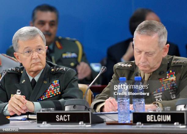 General John Craddock, supreme allied commander for Europe , left, and General James Mattis, supreme allied commander of transformation , listen at...