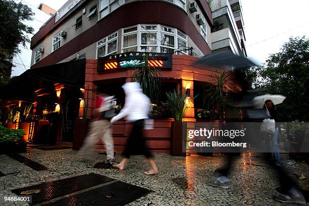 Pedestrians pass by Esplanada Grill restaurant in the Ipanema district of Rio de Janeiro, Brazil, on Monday, June 23, 2008. Grill Esplanada is...