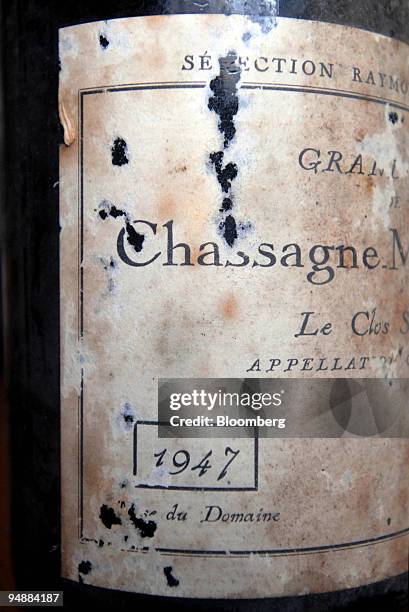 Bottle of Chassagne-Montrachet Clos Saint Jean sits on a table at the los Saint Jean vineyard, in the Burgundy village of Chassagne-Montrachet,...