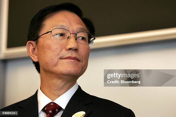 Xie Xuren, China's finance minister, pauses while speaking during the fourth meeting of the U.S.-China Strategic Economic Dialogue held at the U.S....