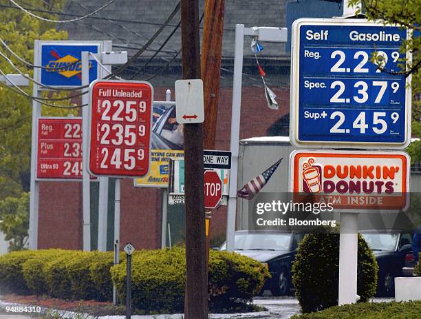 Gasoline prices are displayed on the signs of competing gas stations in Medford, Massachusetts Tuesday, May 24, 2005. Prices have surged this year on...