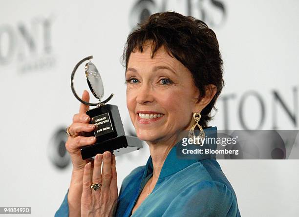 Deanna Dunagan, of the Broadway show "August: Osage County," poses with her Tony award for best performance by a leading actress in a play in the...