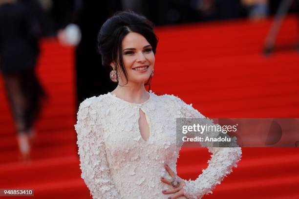 Actress Anna Peskova poses on the red carpet during the opening ceremony of the 40th Moscow International Film Festival at the Rossiya Theatre in...