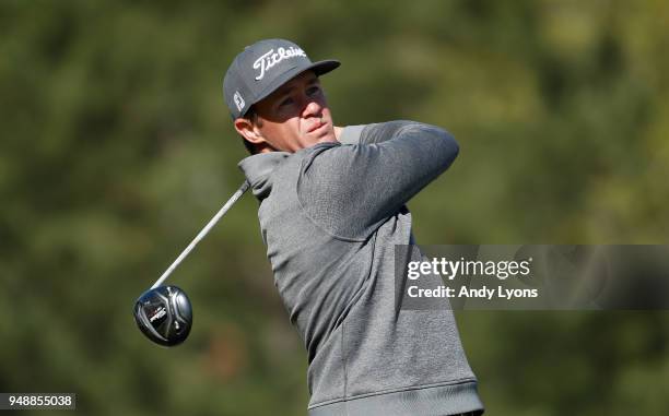 Michael Weaver hits his tee shot on the 17th hole during the first round of the North Mississippi Classic at the Country Club of Oxford on April 19,...