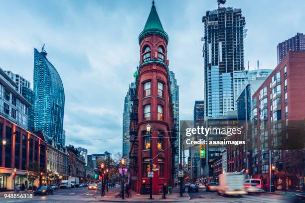 gooderham building at dusk,toronto - toronto streets stock pictures, royalty-free photos & images