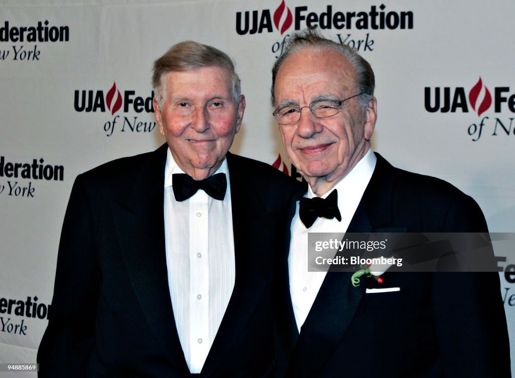 Rupert Murdoch, chairman and CEO of The News Corporation, right