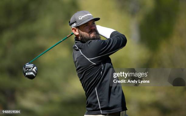 Chip Lynn hits his tee shot on the 17th hole during the first round of the North Mississippi Classic at the Country Club of Oxford on April 19, 2018...