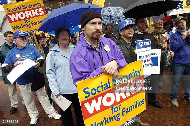 Colin O Leary, center, joins approximately 60 protesters gathered outside Charles Schwab Corp.'s annual stockholder meeting on Thursday, May 19 in...