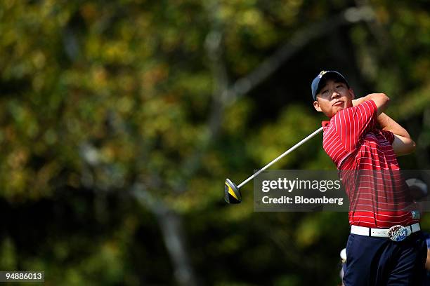 Anthony Kim of the U.S. Team tees off on the 4th hole during a singles match against Sergio Garcia of the European team on day three of the 37th...