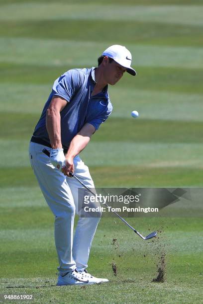 Cody Gribble plays his second shot on the eighth hole during the first round of the Valero Texas Open at TPC San Antonio AT&T Oaks Course on April...