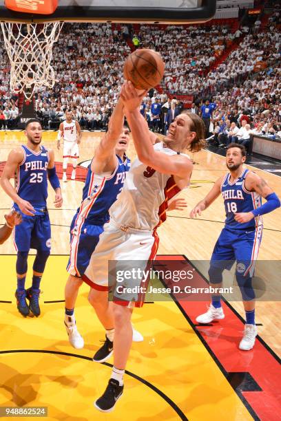 Kelly Olynyk of the Miami Heat goes to the basket against the Philadelphia 76ers in Game Three of Round One of the 2018 NBA Playoffs on April 19,...