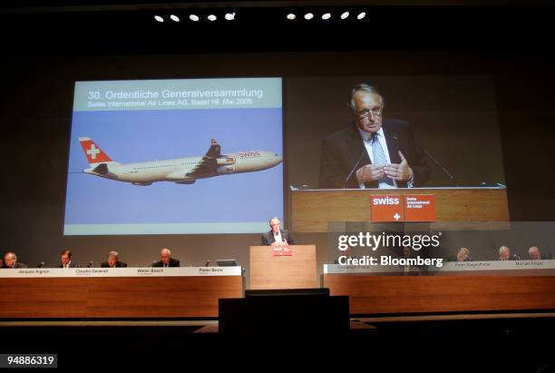 Swiss International Airlines Chairman Pieter Bouw speaks on a large screen at the company's annual general meeting in Basel, Switzerland, Thursday,...