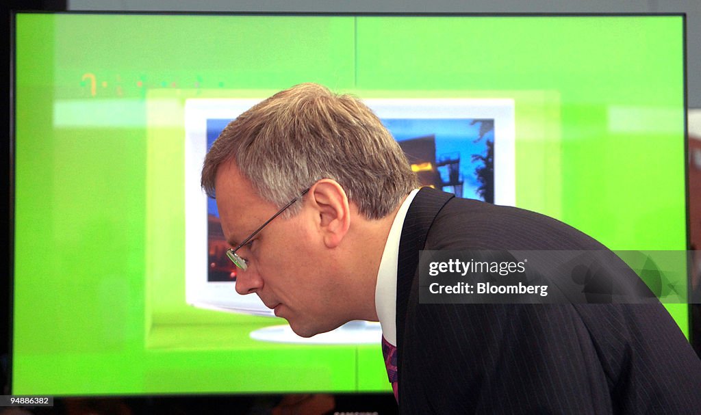 Rimantas Sadzius, Lithuania's finance minister, looks at a S