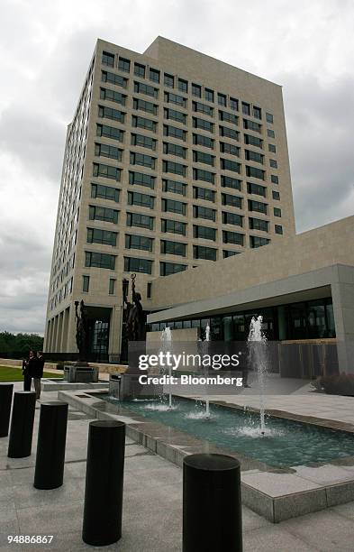 People stand outside of the new Federal Reserve Bank of Kansas City following a dedication ceremony in Kansas City, Missouri, U.S., on Thursday, June...